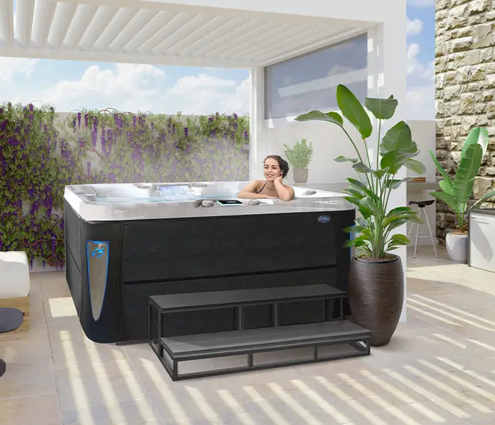 Hot Tubs, Spas, Portable Spas, Swim Spas for Sale Hot Tubs, Spas, Portable Spas, Swim Spas for Sale Calspas hot tub being used in a family setting